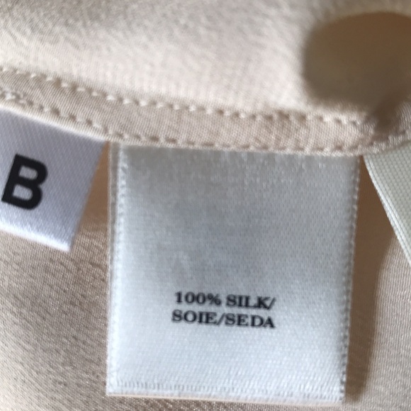 AnnTaylor Silk Cream Shirt size Large. New with Tags .
Never worn - Picture 4 of 5